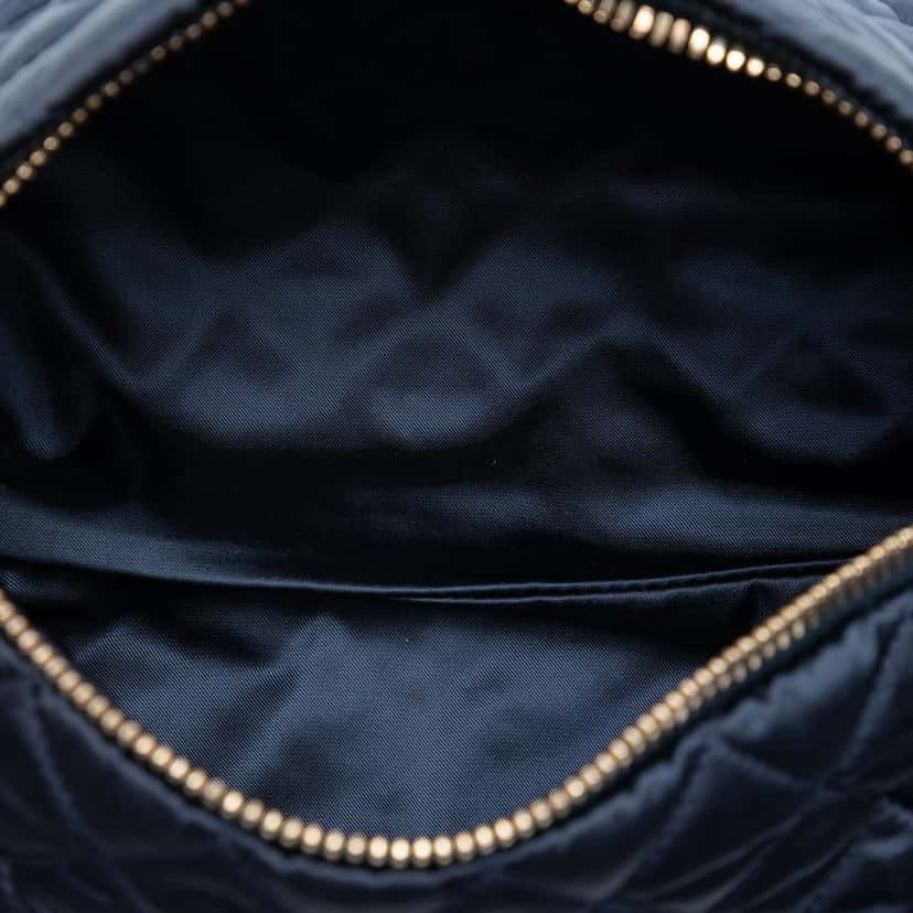 Chanel CC Quilted Nylon Crystal Barrel Crossbody Blue Very good condition - Model View