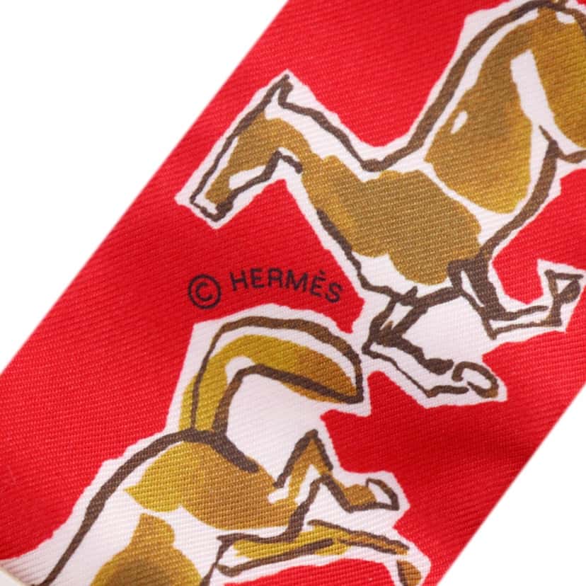 Hermès Chevaux en Liberte Silk Twilly Scarf Red Never worn - Box View