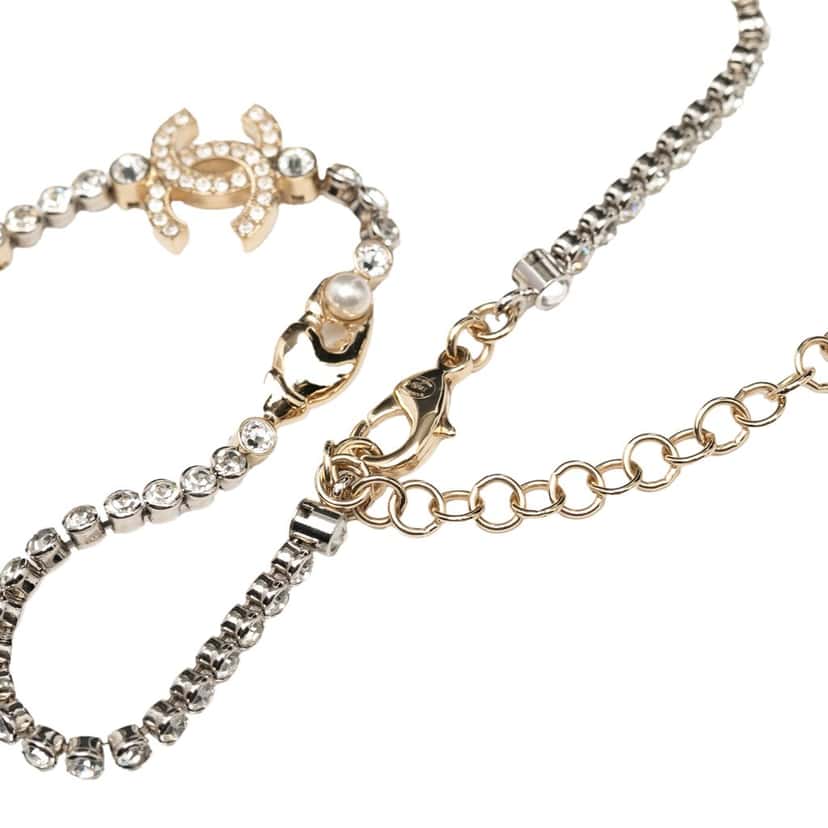 Chanel CC Gold Plated and Brass Strass Charm Necklace Gold Metal Very good condition - Model View