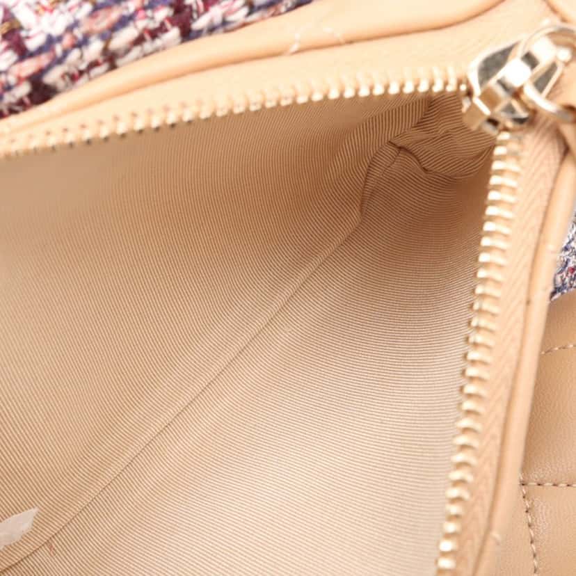 Chanel Tweed and Quilted Lambskin Multi Pocket Drawstring Backpack Beige Very good condition - Model View