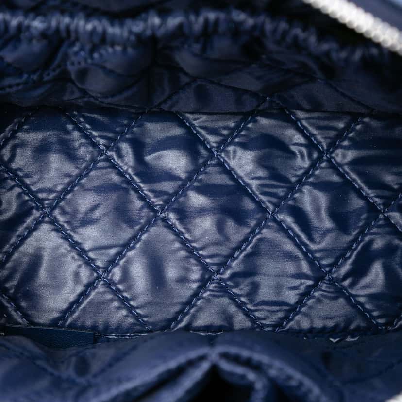 Chanel Large Quilted Lambskin Curvy Cosmetic Pouch Blue Leather Very good condition - Model View