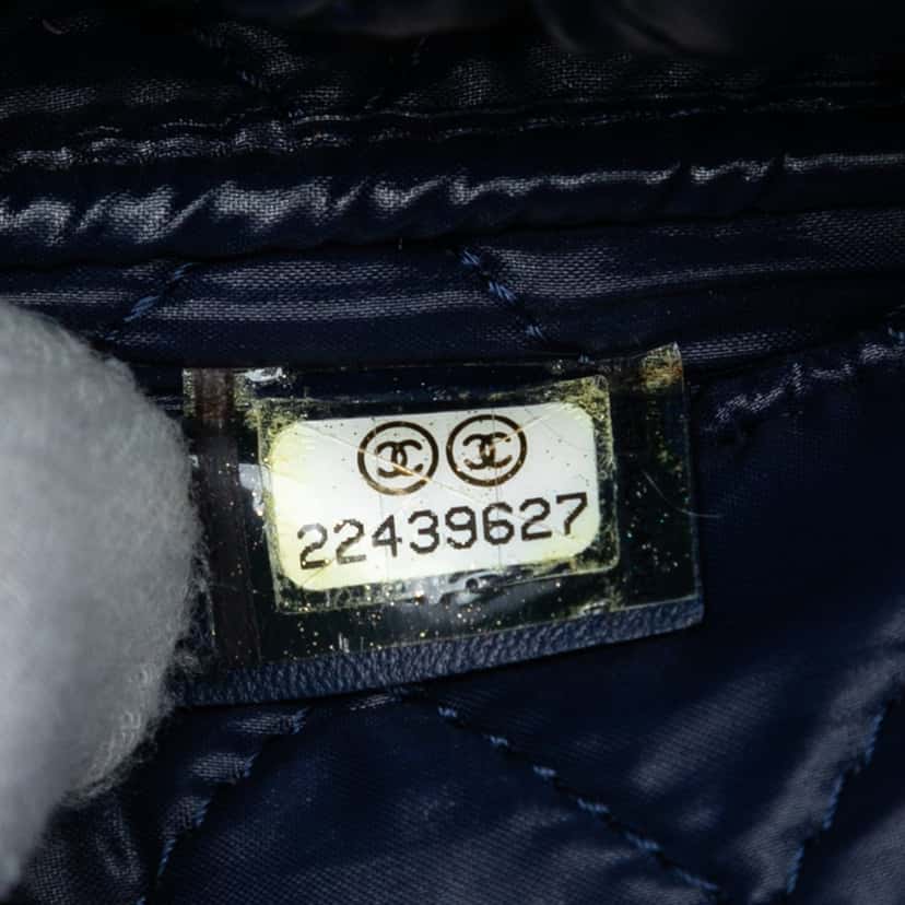 Chanel Large Quilted Lambskin Curvy Cosmetic Pouch Blue Leather Very good condition - Box View