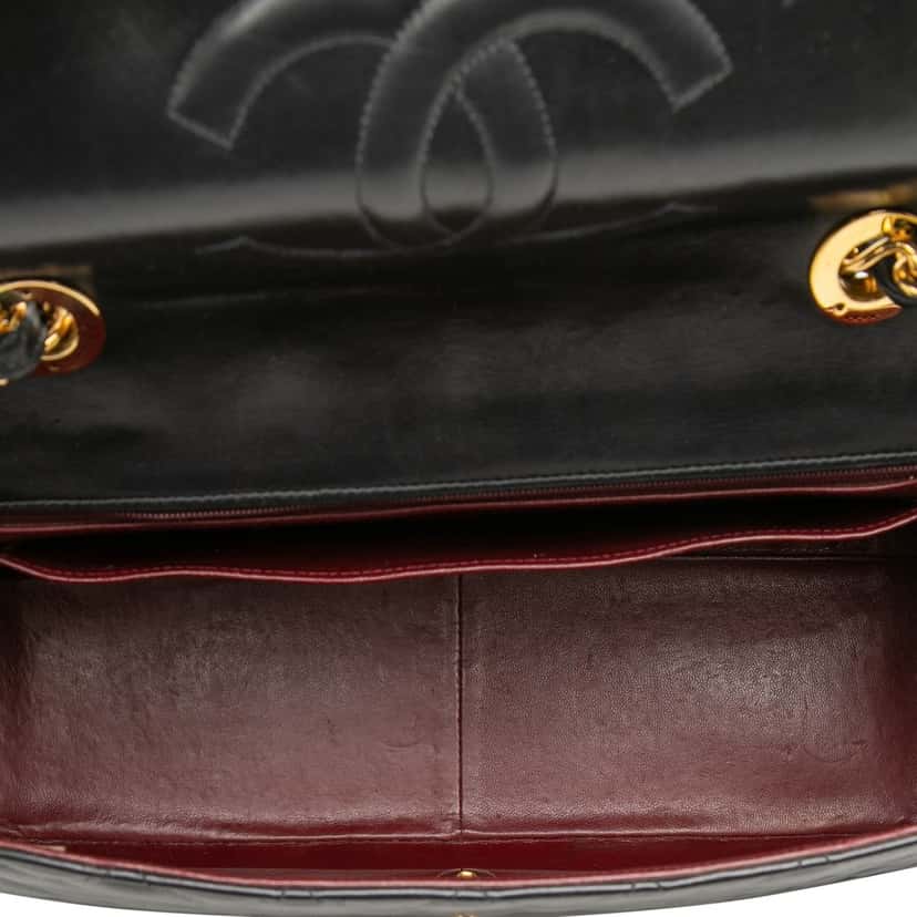 Chanel Maxi XL Classic Lambskin Single Flap Black Leather Good condition - Model View