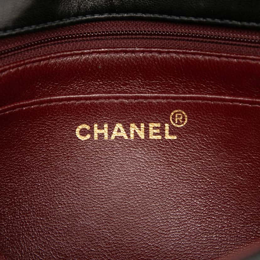 Chanel Medium Vertical Quilted Lambskin Mademoiselle Crossbody Black Leather Very good condition - Box View