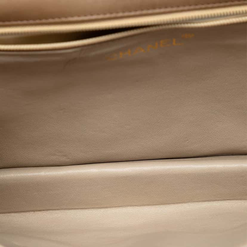 Chanel Quilted Lambskin Tassel Flap Beige Leather Very good condition - Model View