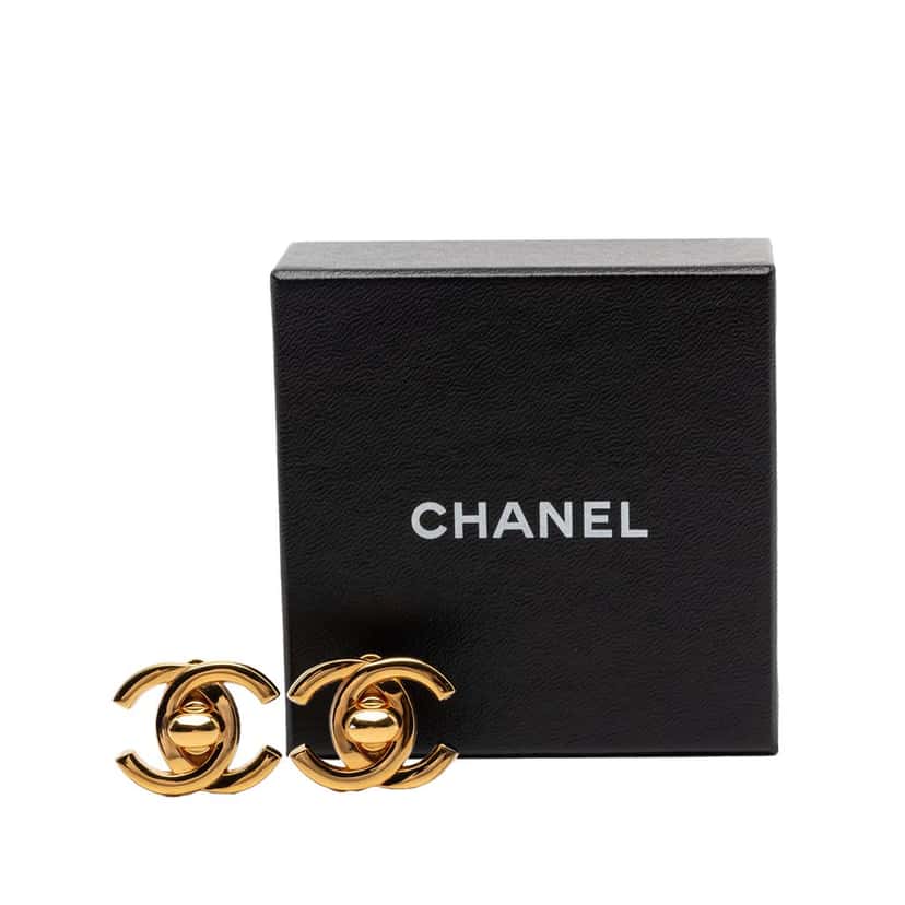 Chanel CC Gold Plated Turn Lock Clip on Earrings Gold Metal Very good condition - Model View