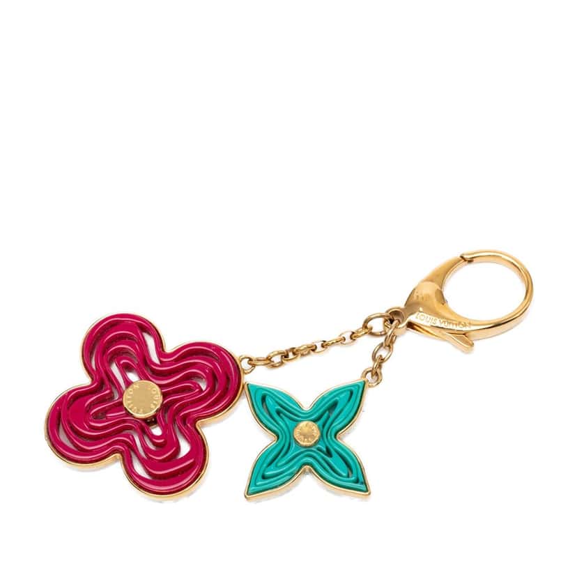 Louis Vuitton Gold Plated and Resin Naif Bag Charm Gold Metal Very good condition - Front View