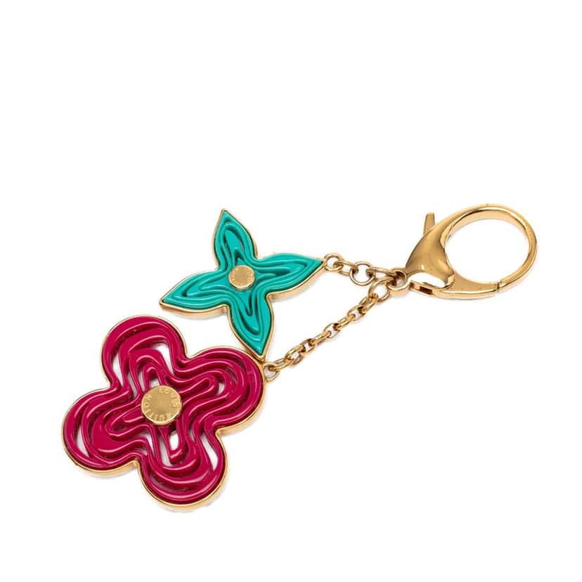 Louis Vuitton Gold Plated and Resin Naif Bag Charm Gold Metal Very good condition - Back View