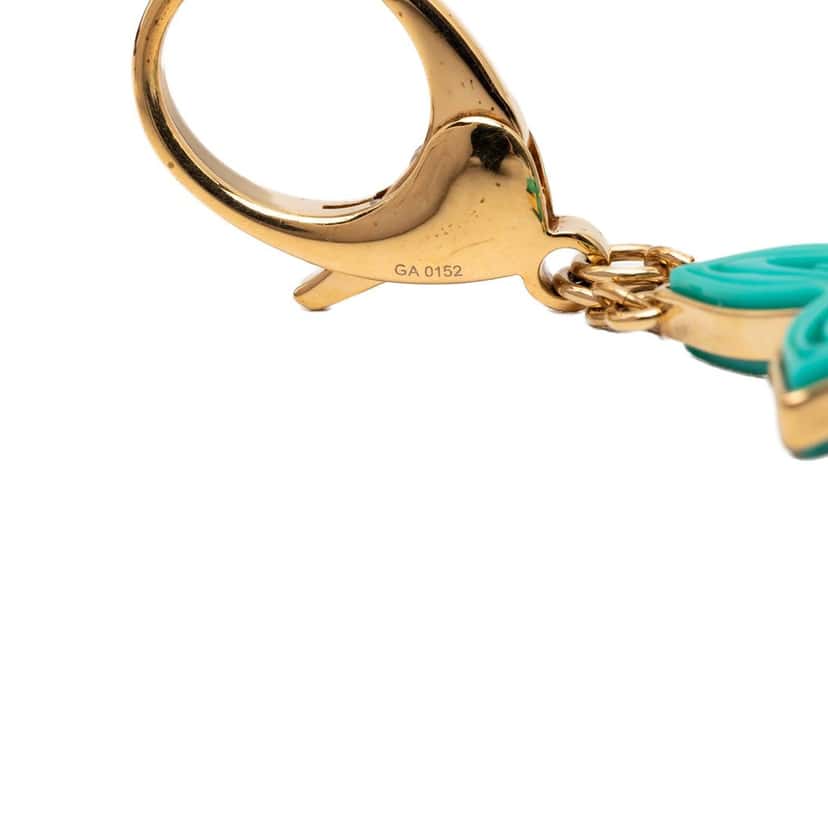 Louis Vuitton Gold Plated and Resin Naif Bag Charm Gold Metal Very good condition - Inside View