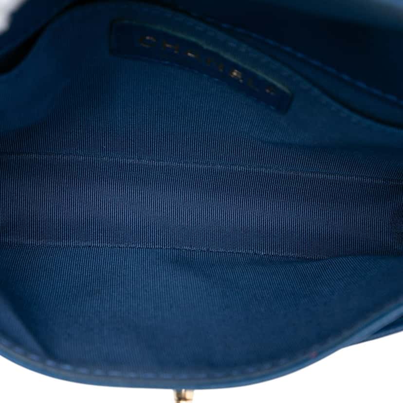 Chanel Mini Quilted Goatskin Coco Curve Flap Blue Leather Never worn, with tag - Model View