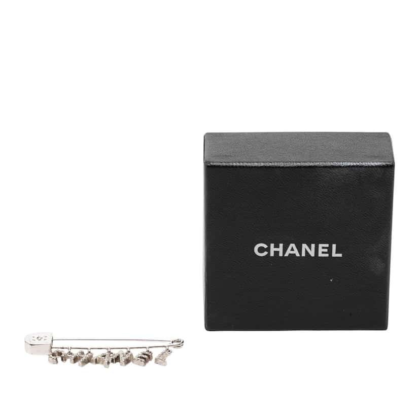 Chanel Brass and Strass Logo Letter Safety Pin Brooch Silver Metal Very good condition - Model View