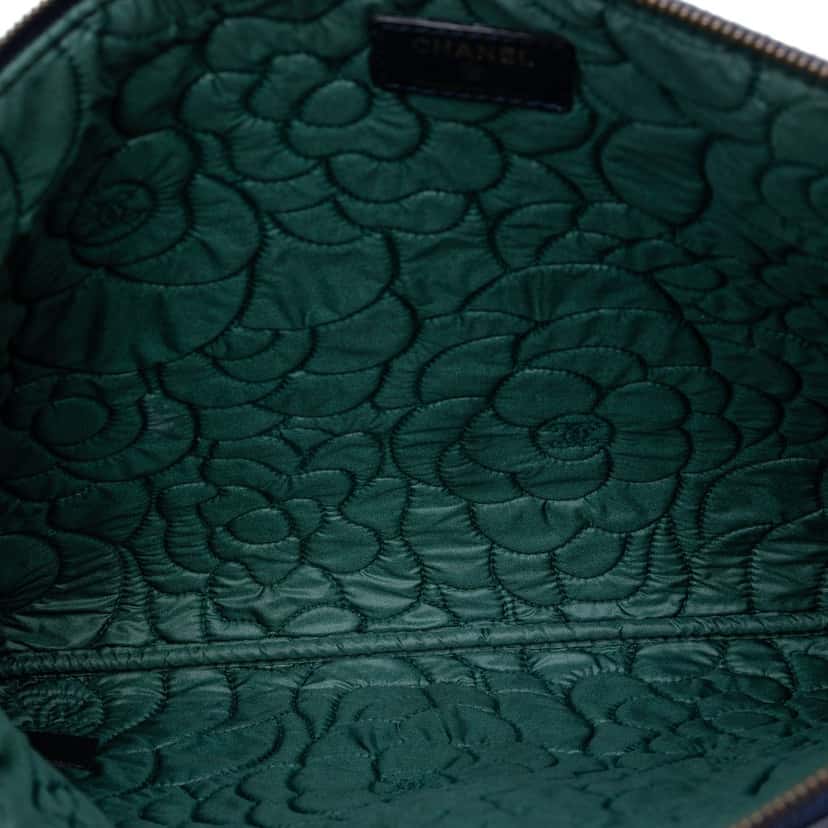 Chanel Large Embossed Lambskin Camellia O Case Clutch Blue Leather Very good condition - Model View