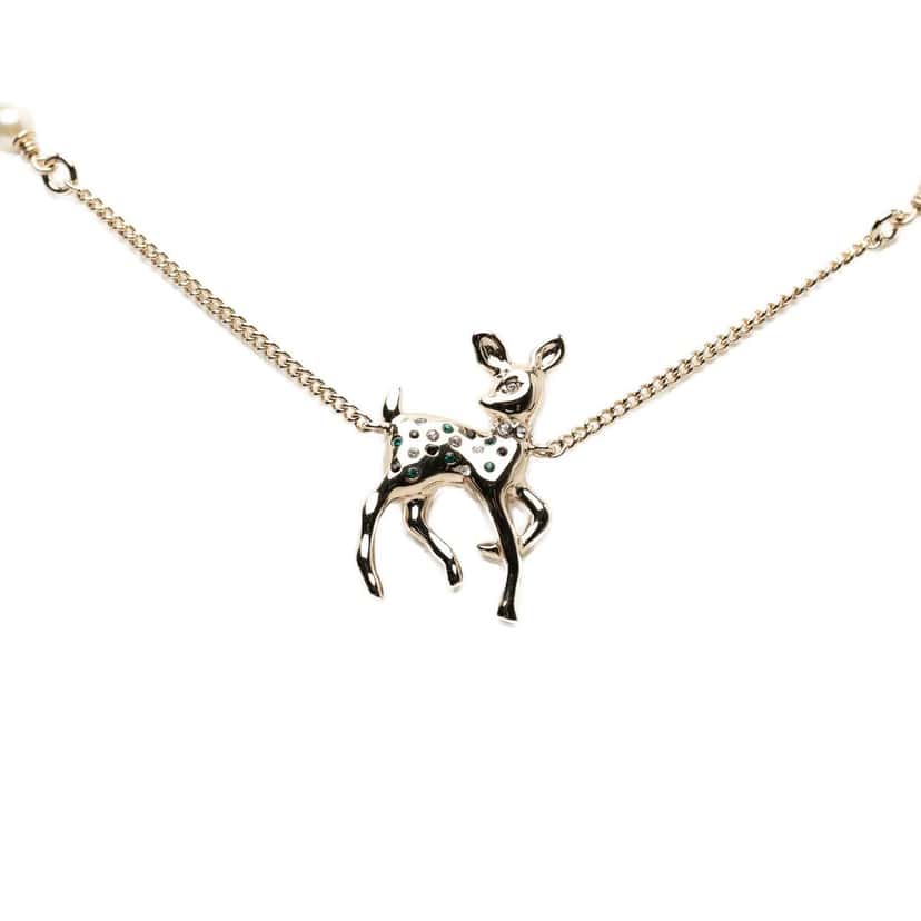 Chanel CC Gold Plated Faux Pearl and Strass Deer Pendant Necklace Gold Metal Very good condition - Front View