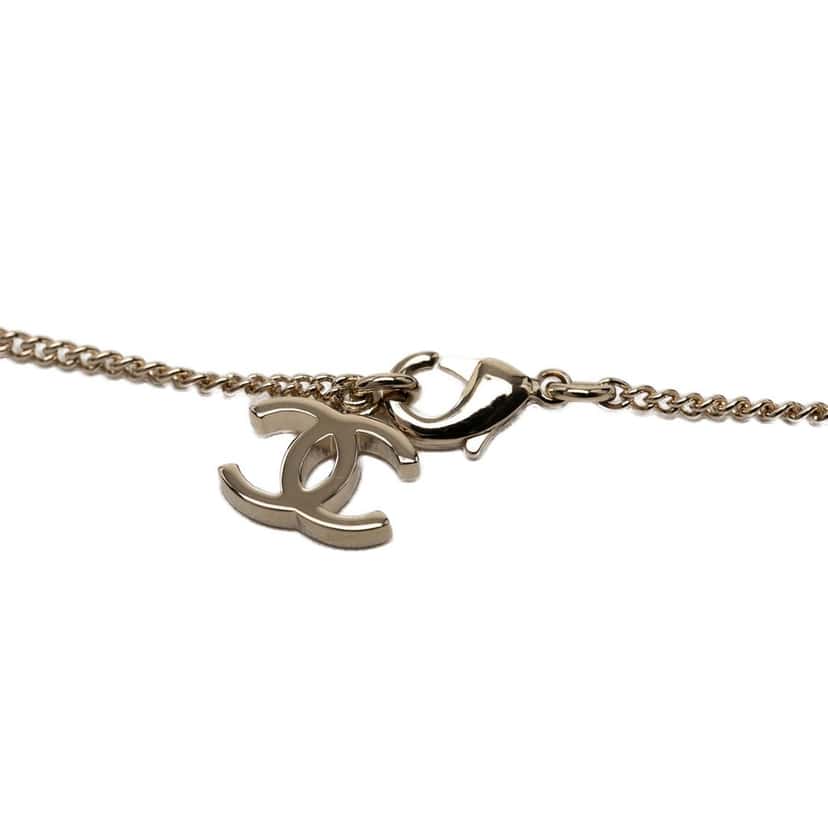 Chanel CC Gold Plated Faux Pearl and Strass Deer Pendant Necklace Gold Metal Very good condition - Inside View