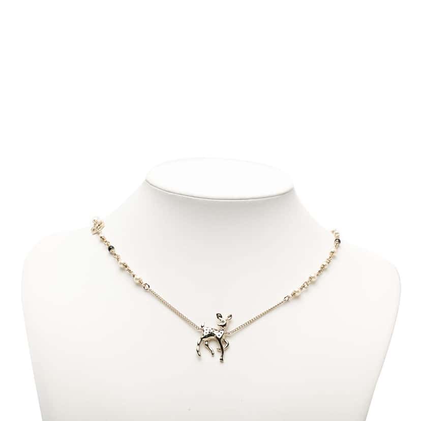 Chanel CC Gold Plated Faux Pearl and Strass Deer Pendant Necklace Gold Metal Very good condition - Box View