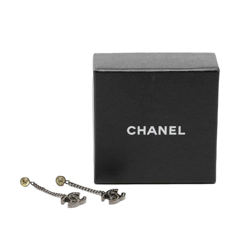 Chanel CC Brass and Strass Swing Push Back Earrings Silver Metal Very good condition - Model View