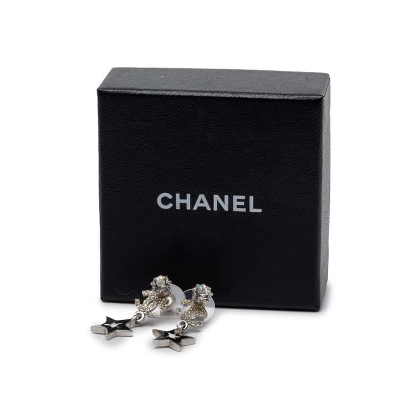 Chanel CC Brass and Strass Star Drop Push Back Earrings Silver Metal Very good condition - Model View