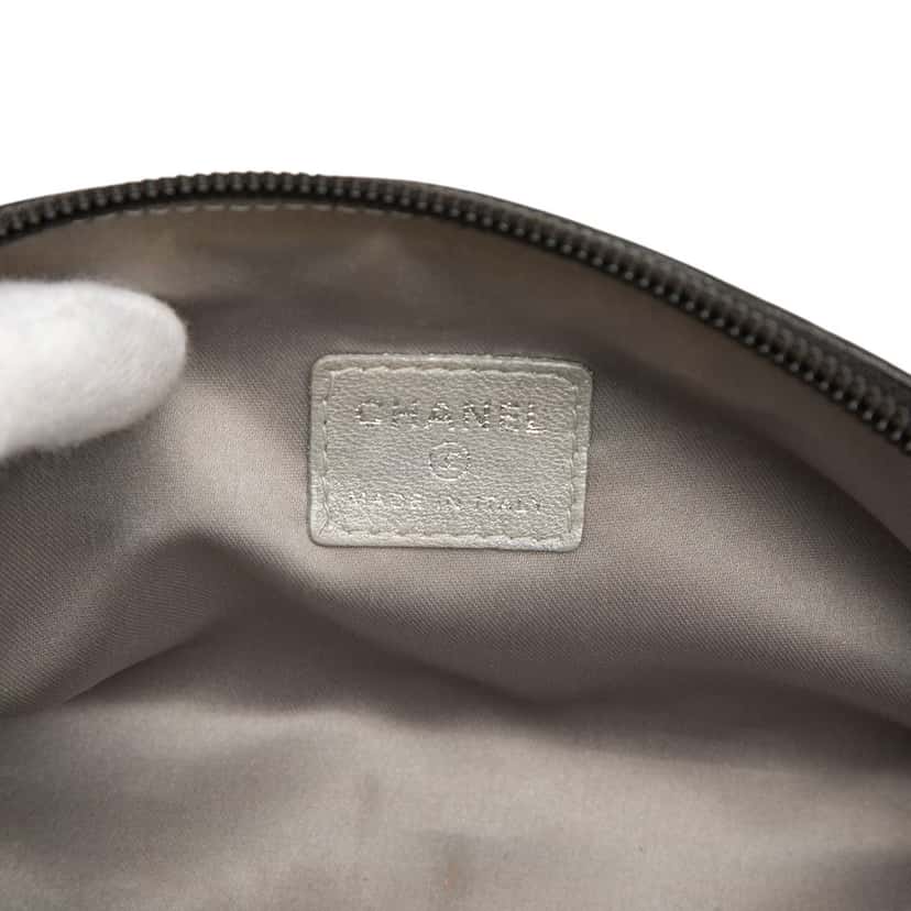 Chanel Embossed Lambskin Camellia Pouch Black Leather Very good condition - Box View