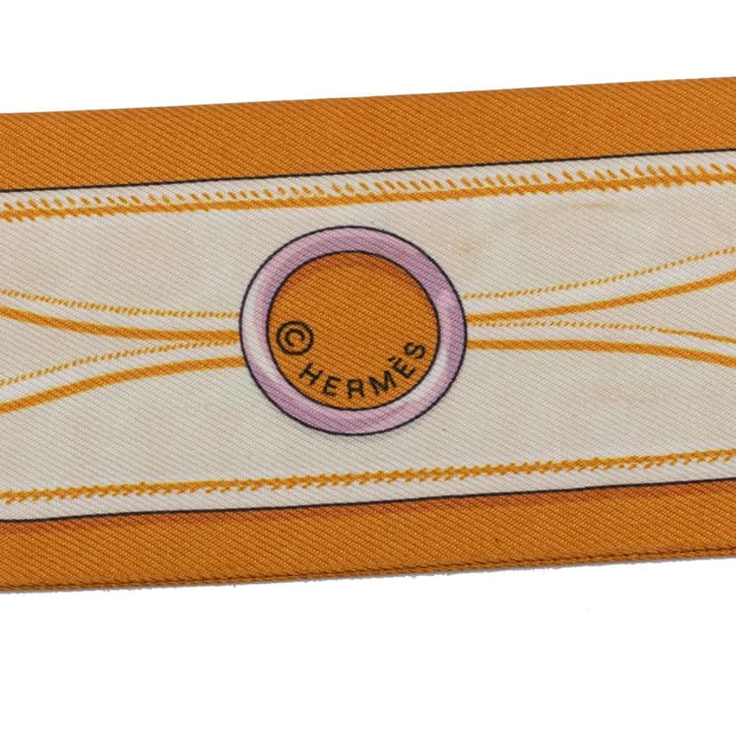 Hermès Maillons Silk Twilly Scarf Orange Very good condition - Model View