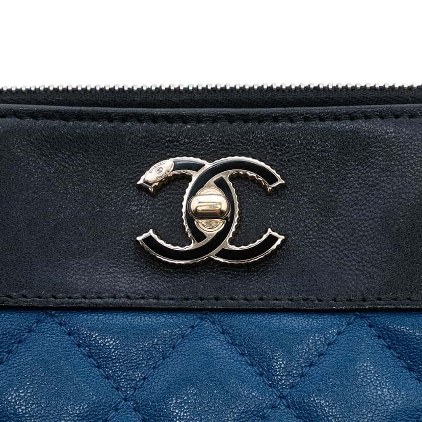 Chanel Medium Bicolor Quilted Sheepskin Mademoiselle O Case Clutch Blue Leather Very good condition - Box View