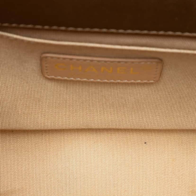 Chanel Small Quilted Metallic Lambskin Boy Flap Gold Leather Very good condition - Model View