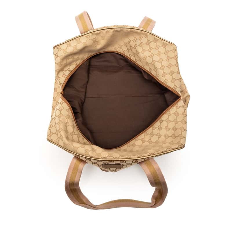 Gucci GG Canvas Web Duffle Bag Beige Never worn, with tag - Model View