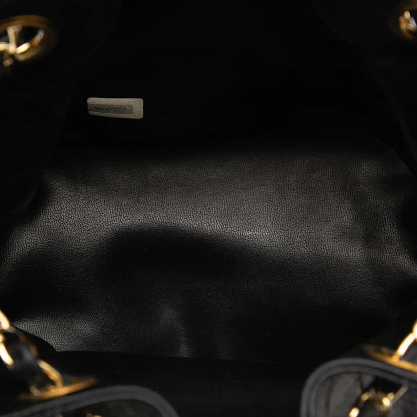 Chanel Quilted Lambskin Drawstring Chain Bucket Bag Black Leather Very good condition - Model View