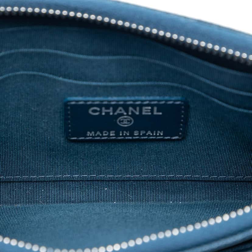 Chanel Quilted Caviar Boy Pouch Blue Leather Very good condition - Model View
