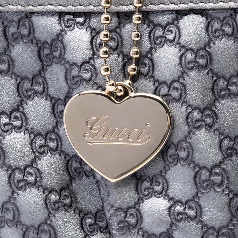 Gucci Microguccissima Heart Wristlet Pochette Silver Leather Very good condition - Box View