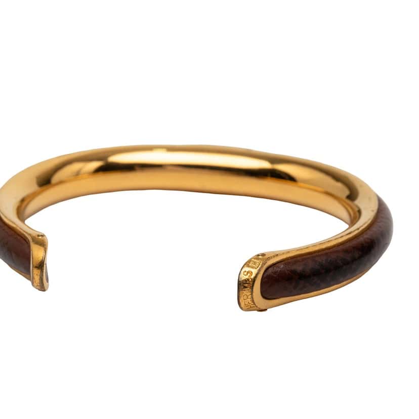 Hermès Gold Plated and Leather Cuff Bracelet Gold Metal Very good condition - Model View