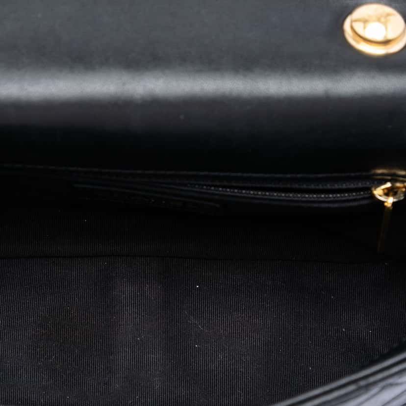 Chanel Small Quilted Lambskin Round Top Handle Flap Black Leather Very good condition - Model View
