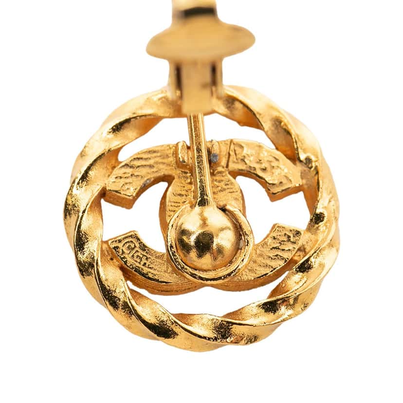 Chanel Gold Plated CC Crystal Twisted Round Clip On Earrings Gold Metal Never worn, with tag - Model View