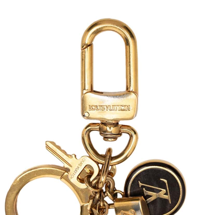 Louis Vuitton Gold Plated and Enamel Pampille Bag Charm and Key Holder Gold Metal Never worn, with tag - Model View