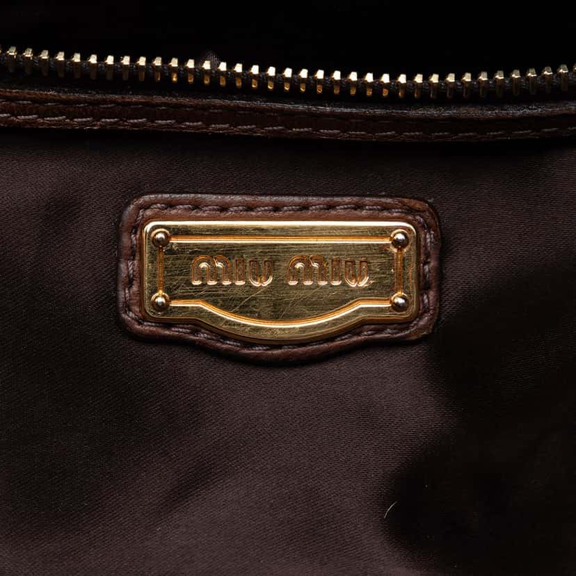 Miu Miu Studded Leather Top Handle Bag Brown Leather Very good condition - Box View