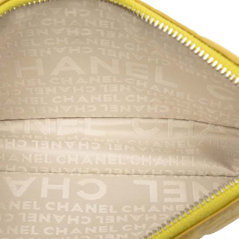 Chanel Lambskin Precious Symbols Pochette Yellow Leather Very good condition - Model View