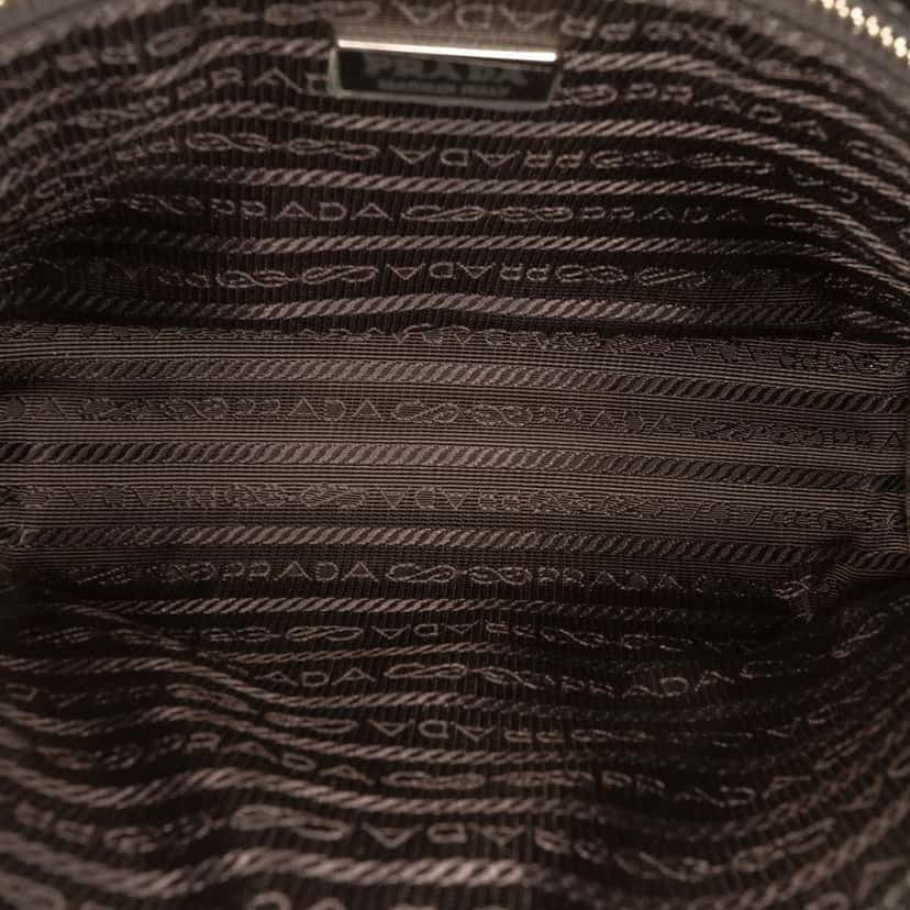 Prada Metallic Saffiano Wristlet Clutch Silver Leather Very good condition - Model View