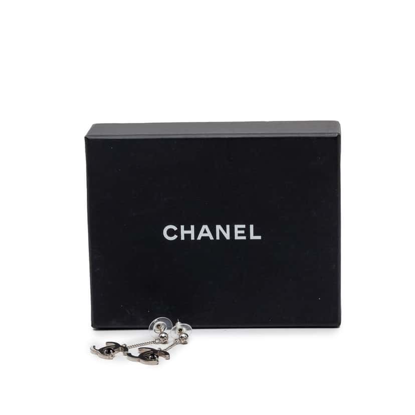Chanel CC Brass Strass Dangle Push Back Earrings Silver Metal Very good condition - Model View