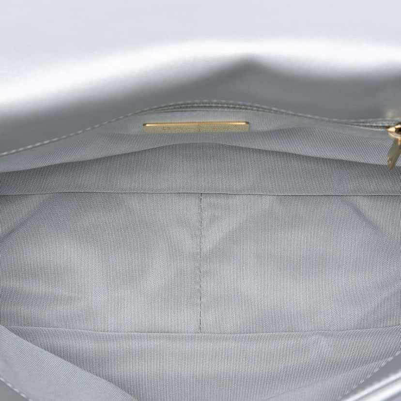 Chanel Large Metallic Lambskin 19 Flap Silver Leather Very good condition - Model View