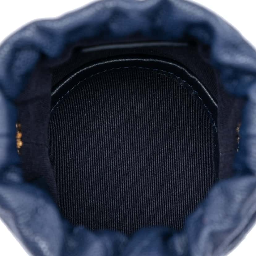 Chanel Mini Quilted Caviar Medallion Charms Drawstring Bucket Bag Blue Leather Very good condition - Model View