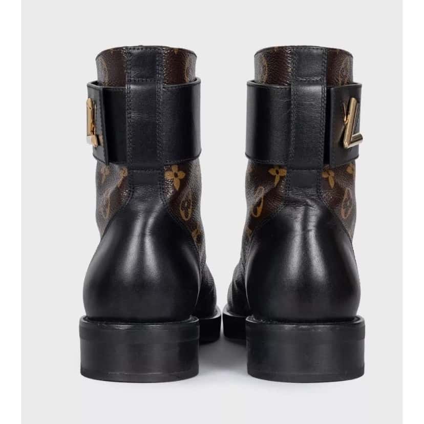 Louis Vuitton Louis Vuitton Wonderland Leather & Canvas Ankle Boots Sz 38 pre-owned Brown Leather Good condition - Model View