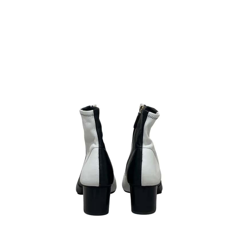 Chanel NWOB Chanel 20B Black & White Leather Ankle Boots - Sz 40.5 Pre-owned Black Leather Never worn - Model View