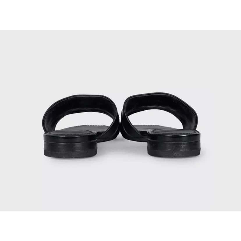 Louis Vuitton Louis Vuitton Black Leather Gold Hardware Slides Sz.39  Pre-owned Black Leather Good condition - Model View