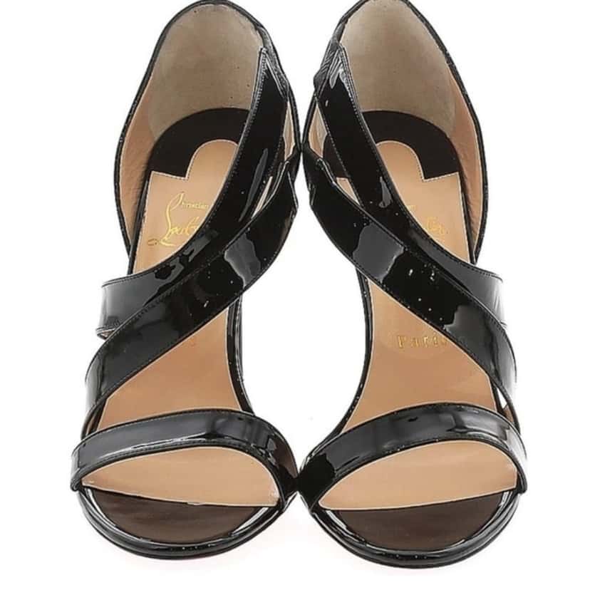 Christian Louboutin Strappy Heels Black Leather Never worn, with tag - Model View