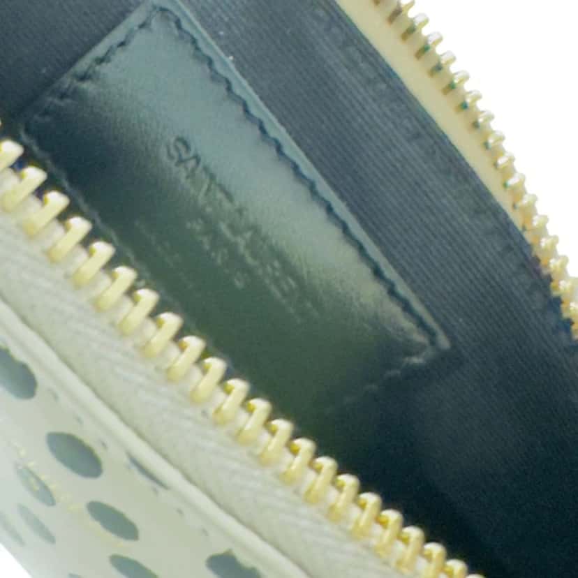 Saint Laurent Saint Laurent Polka Dot Calfskin Leather Small Pouch Beige Leather Never worn - Model View