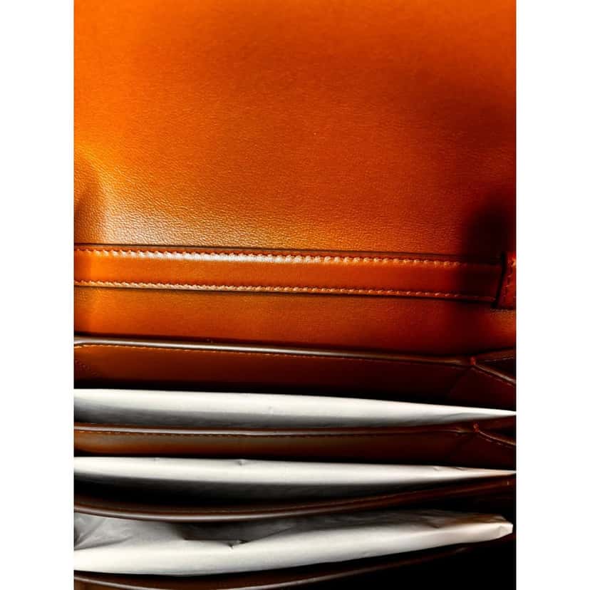 Salvatore Ferragamo Ferragamo Trifolio Soft Leather Flap Crossbody Bag Sella Brown Gold Gancini Closure Black Leather Never worn - Model View