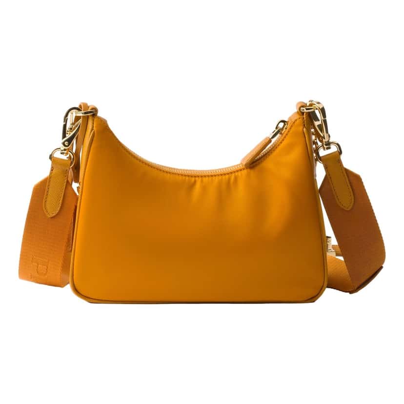 Prada Prada Re-Edition 2005 Orange Re-Nylon and Saffiano Leather Shoulder Bag with Robot Charm Strap Orange Never worn - Model View