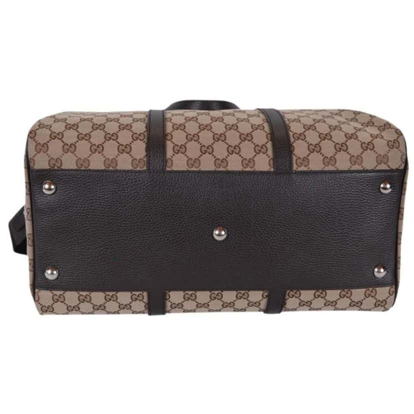 Gucci Gucci Large GG Logo Beige Canvas Brown Leather Strap Duffle Bag Brown Canvas Good condition - Model View