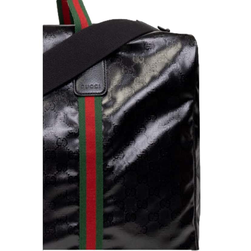 Gucci Gucci Duffle Maxi GG Black Glossy Fabric Duffel Bag Leather Trim Black Leather Never worn - Model View
