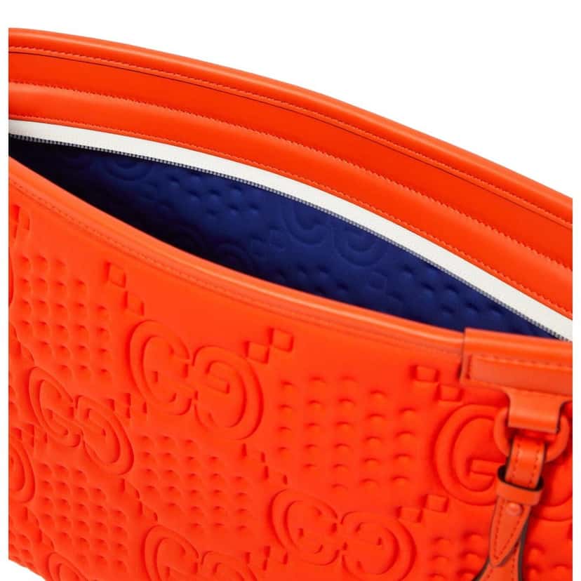Gucci Gucci Off The Grid GG Embossed Orange Rubber Pouch Clutch Bag Orange Good condition - Model View