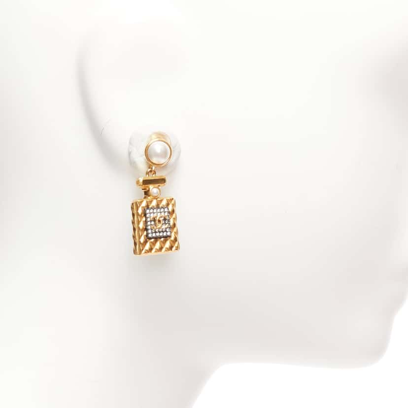 Chanel Perfume Bottle Earrings Gold Metal Never worn - Model View